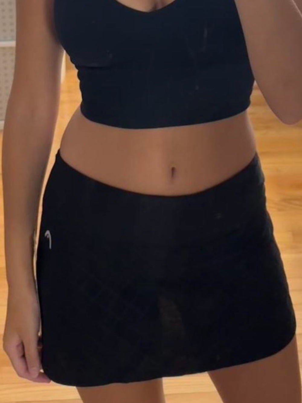 Black Athletic Skort with Subtle Logo . I'm 5'2 , 115 lbs